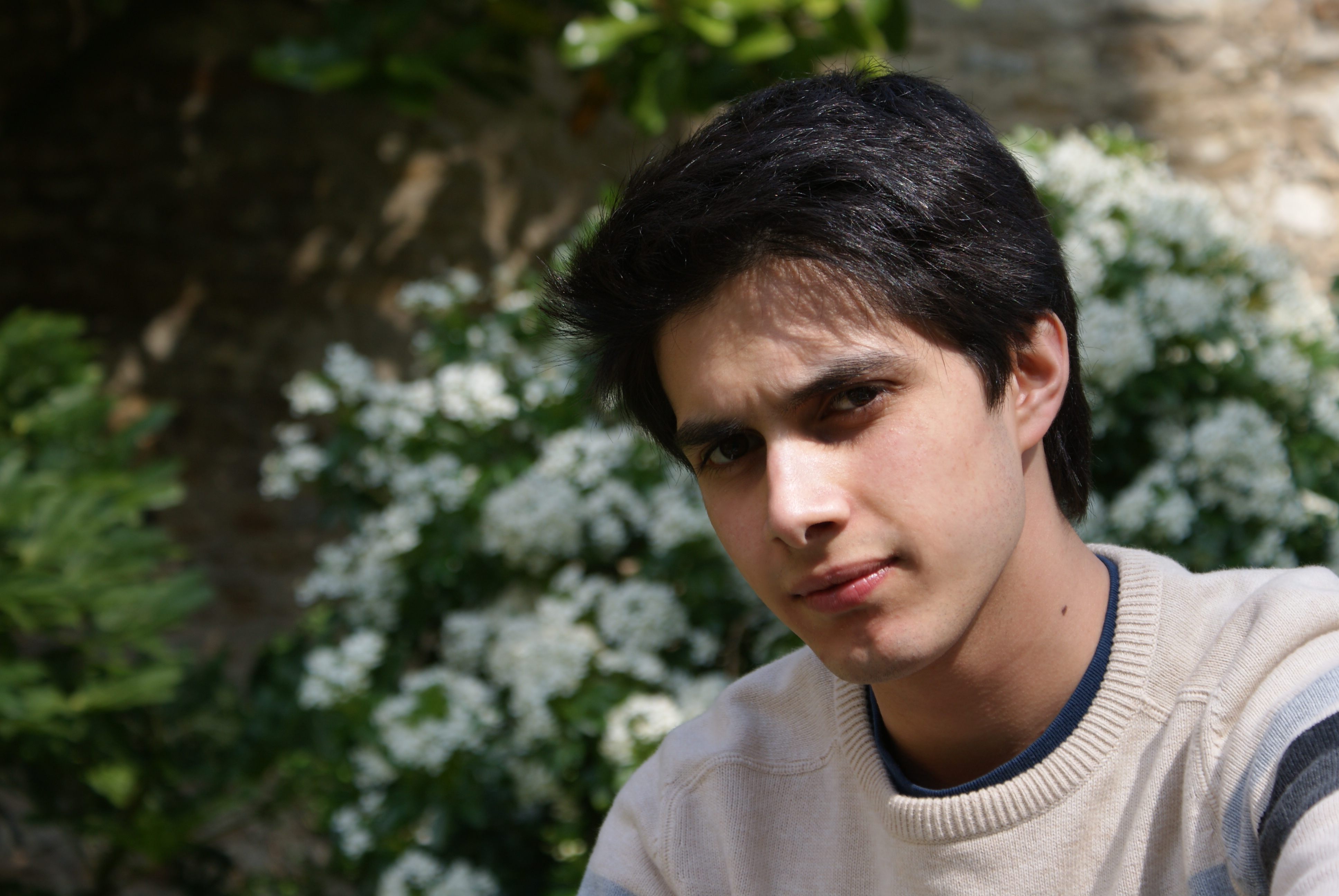 Clear, well-lit portrait reference photo with soft background blur